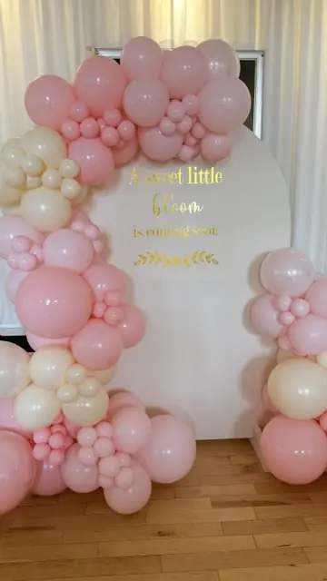 Blush balloon arch for a baby shower