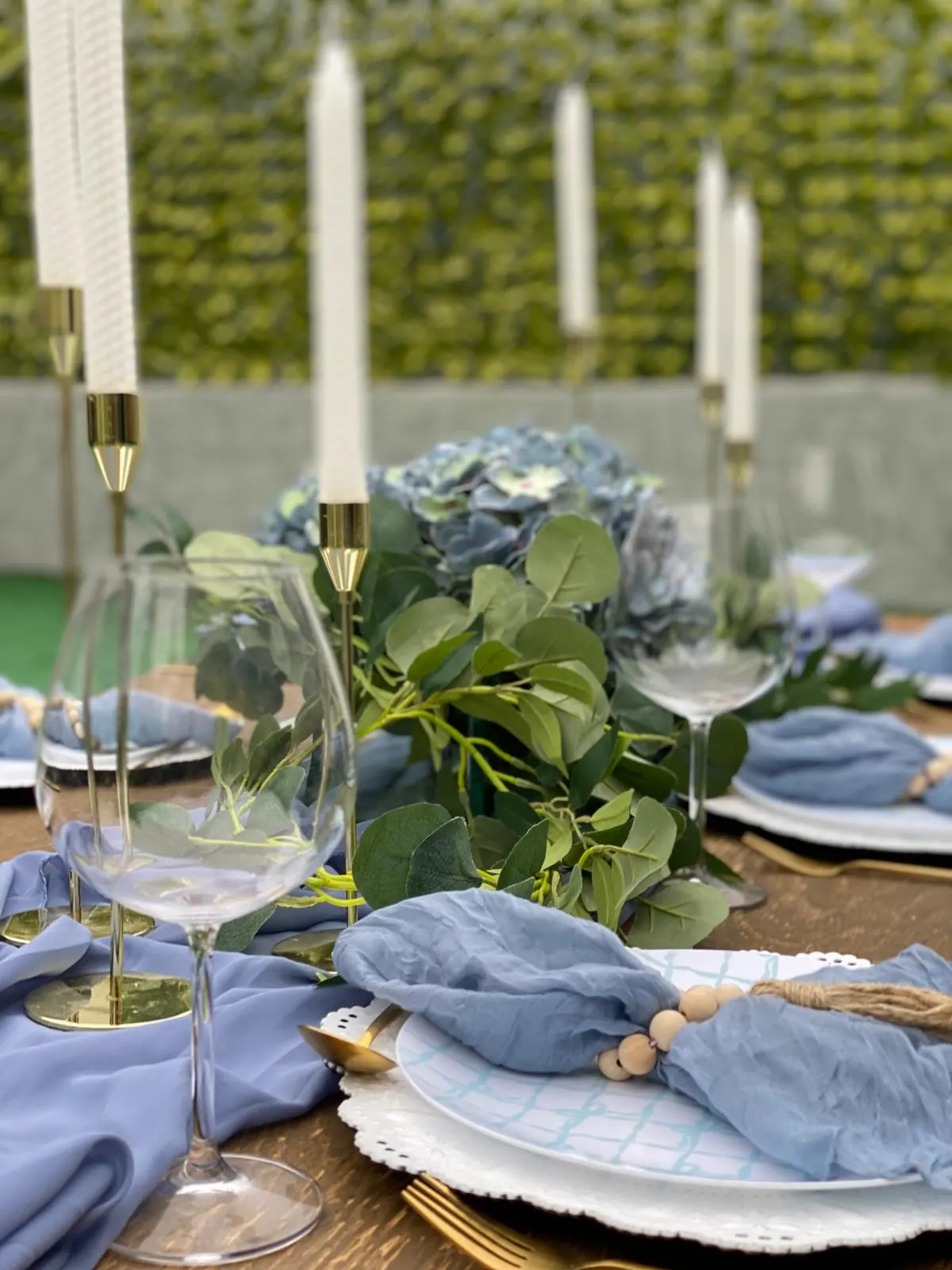 Blue hydrangeas and taper candles